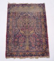 A Persian rug with bird in flowering tree design, 120 x 90cm