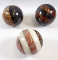 Three carved marble specimen balls