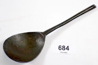 A mid 17th century latten spoon with slip top and impressed mark to bowl, 16.5cm