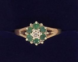 A 9 carat gold emerald ring, size O to P