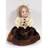 A Victorian bisque headed small doll with porcelain legs, 16cm