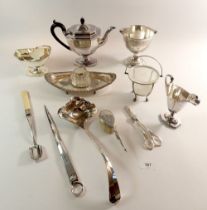 A box of silver plated items including three piece tea set, grape scissors, skewer, stilton scoop