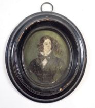 An oil on paper miniature of a young woman inscribed to verso Joufrim Plater, 6 x 5cm