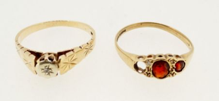 A gold ring set chip diamond - unmarked, size R and a 9 carat gold garnet set ring - a/f, size S &