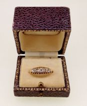 An 18 carat gold five stone diamond ring (unmarked) size O, 2.9g - boxed