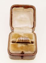 An 18 carat gold five stone diamond ring, 3.5g, size O/P, boxed