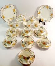 A Royal Albert Edwardian floral tea service comprising two tea pots, milk, jug, sugar, seven cups