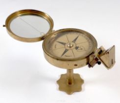 A brass pedestal compass by Stanley