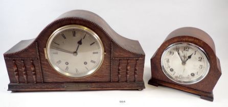 An oak cased Garrard striking mantel clock, 18cm tall and another larger oak mantel clock