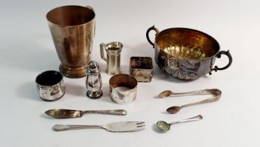 A sterling silver mug 249g, a silver salt and pepper and napkin ring 74g and various silver plated