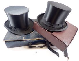 Two collapsable silk top hats in cardboard boxes by Carl Dehardi