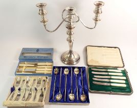 A silver plated candelabra, a vintage set of six cocktail spoons with straw handles, five silver and