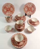 A Japanese eggshell Kutani tea service comprising seven cups and eleven saucers, seven tea plates,