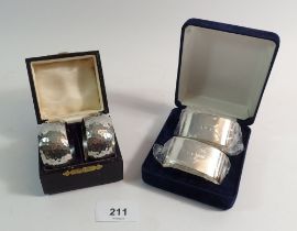 Two silver oval napkin rings - boxed, Sheffield 1996, 68g, plus two pewter ones boxed