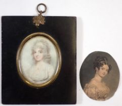 Two 19th century printed miniature portraits and ebonised frame