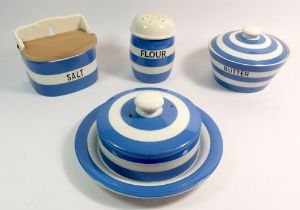 A group of Cornish Ware comprising butter dish, flour shaker, salt box, cheese dish