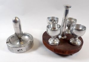 A aluminium German prisoner of war eggcup stand and Zeppelin ashtray