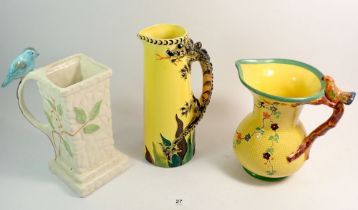 Three various 1930's jugs with dragon or bird handles