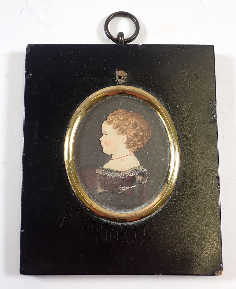 A watercolour cut out miniature of a young girl in 17th century dress, 5.5 x 4.5cm