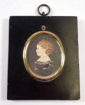 A watercolour cut out miniature of a young girl in 17th century dress, 5.5 x 4.5cm