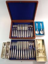 A silver plated fish cutlery set in mahogany box and various silver plated cutlery