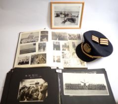 Two photograph albums containing over 250 black and white photos and ephemera relating to D