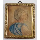 A watercolour miniature portrait of a woman in Middle Eastern attire, gilt laurel leaf frame, 10.5 x