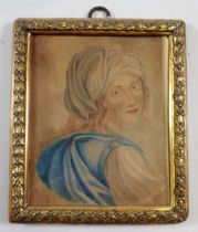 A watercolour miniature portrait of a woman in Middle Eastern attire, gilt laurel leaf frame, 10.5 x