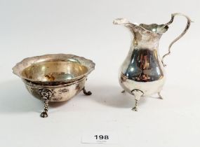A silver milk jug, 1915 by George Unite and a silver sugar bowl, London 1915 - total 258g