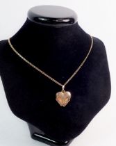A 9 carat gold heart locket on chain, 8.3g, 45cm chain