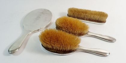 A four piece silver dressing table set, 1921