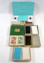 A Tiffany & Co bridge card game set together with four twin set packs of cards by Fournier and