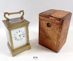 A 19th century French brass carriage clock with travelling case and key, 12.5cm