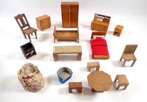 A box of vintage dolls house bedroom and dining furniture