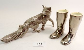 A pair of silver plated spirit measures in the form of huntsmen's boots and and silver plated fox