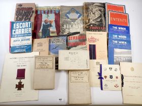 A box of military war ephemera magazines, books, maps etc.