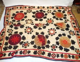 A large Usbek tribal Susani bed cover 280 x 320 approx. (some staining)