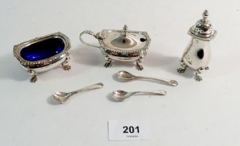A silver three piece cruet set and matching spoons, 146g total weight