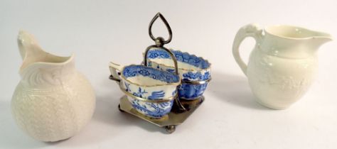 A silver plate and blue and white china cream and sugar stand, a Wedgwood jug and a Cobridge press