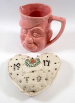 An 'Old Bill' mug and a 1917 pin cushion