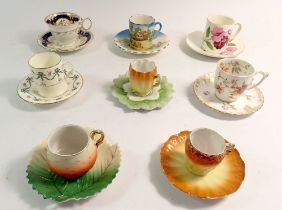 Eight various decorative coffee cans and saucers