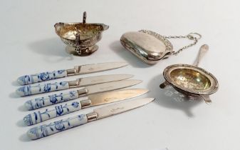 A group of silver to include a tea strainer, Sheffield 1717, a salt a/f, London 1788 and purse a/