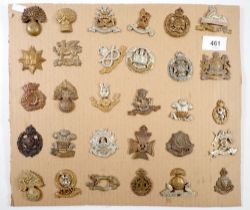 A display of 30 British military cap badges, Lancashire Fusiliers, Staffordshire, Lincolnshire,
