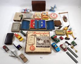 A collection of playing cards and other collectables