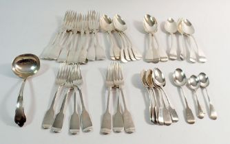 A quantity of silver cutlery including some Georgian 1747g