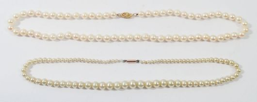 Two single string pearl necklaces with 9 carat gold clasps