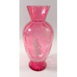 A Victorian Mary Gregory style cranberry vase, 24.5cm tall