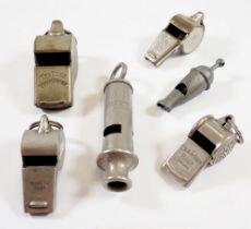 Six various whistles including Acme