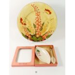 A Crown Ducal plate painted orange flowers and butterflies, 28cm diameter and a Crown Devon preserve