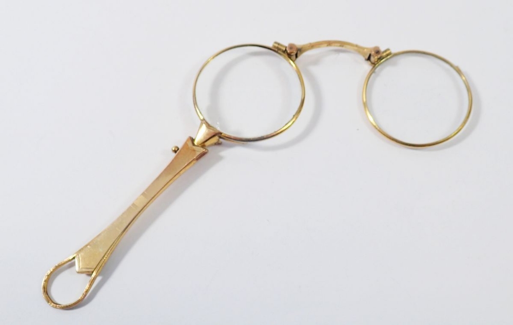 An Edwardian gold plated lorgnette